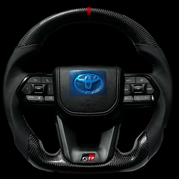 Toyota GR300 Sport Carbon Steering Wheel – Land Cruiser, Hilux, Fortuner & Prado (2010+) (inc. Slipring)